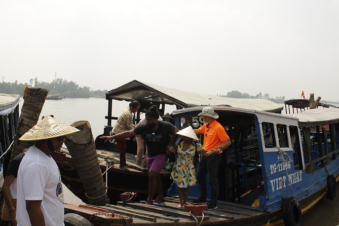 1-Day Mekong Delta Cai Rang Floating Market-Ancient House-Pancake - Fruit, folk music, pancakes, and lunch