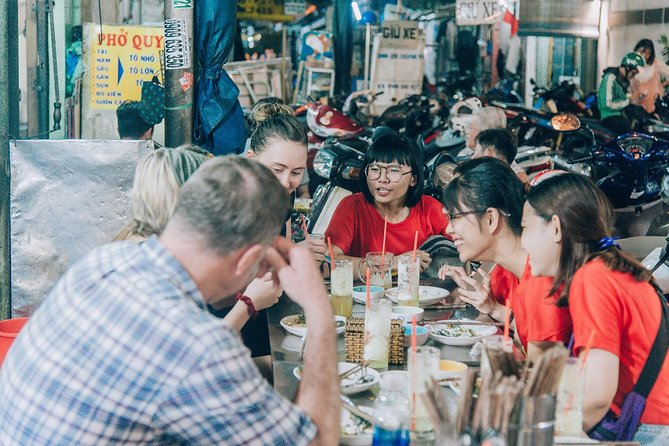 12 Tasting Street Food & Sightseeing By Scooter with Student - Ho Thi Ky Flower Market after dark