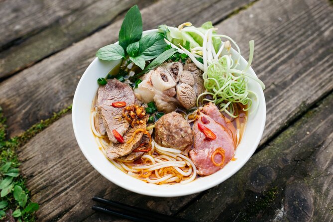 12 Tasting Street Food & Sightseeing By Scooter with Student - The Thich Quang Duc Monument and Vietnam’s difficult past
