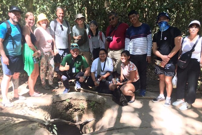 6 Hours Historical Tour in Cu Chi Tunnel with Free Snack - Camouflaged entrances and wartime traps