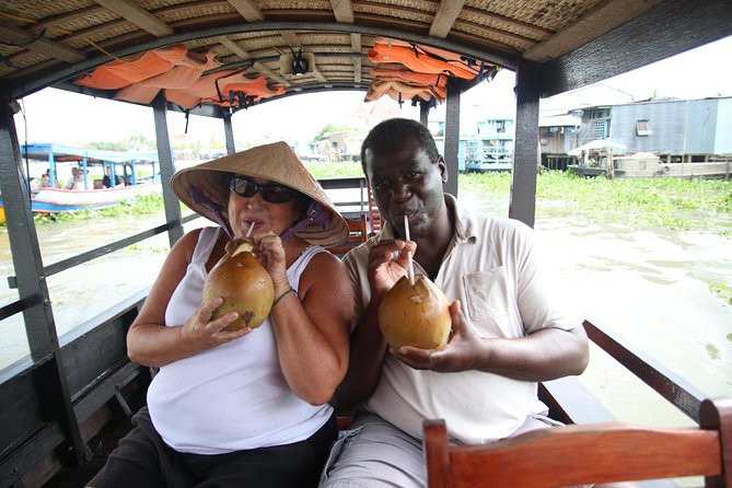 Cai Be Mekong Delta Tour: Cooking Class, Cycling & Craft Villages - Coconut candy, rice popcorn, and folk music