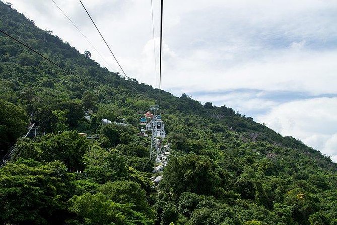 Cao Dai Temple And Black Lady Mountain Day Tour - Riding the cable car up Black Lady Mountain