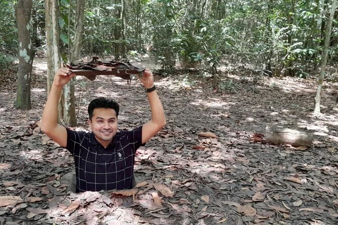 Crawl and Paddle Full day Cu Chi Tunnels and MeKong Delta - A rowboat, tropical gardens, and honey tea