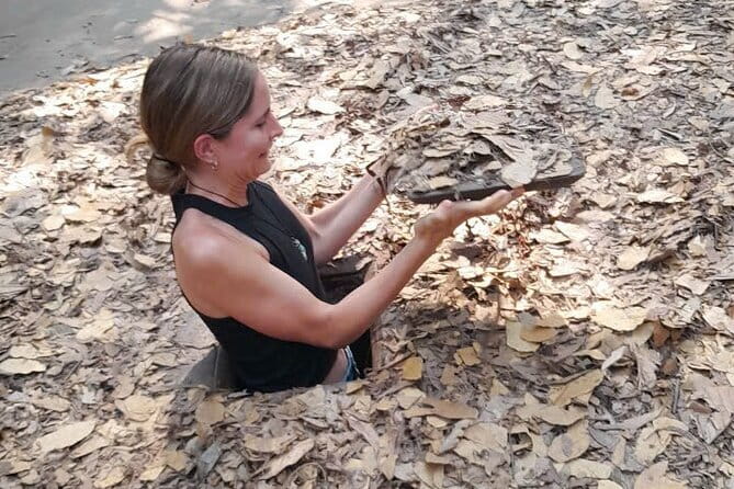 Cu Chi Mekong Delta 1 Day Luxury Small Group - Entering the Cu Chi Tunnels at Ben Dinh