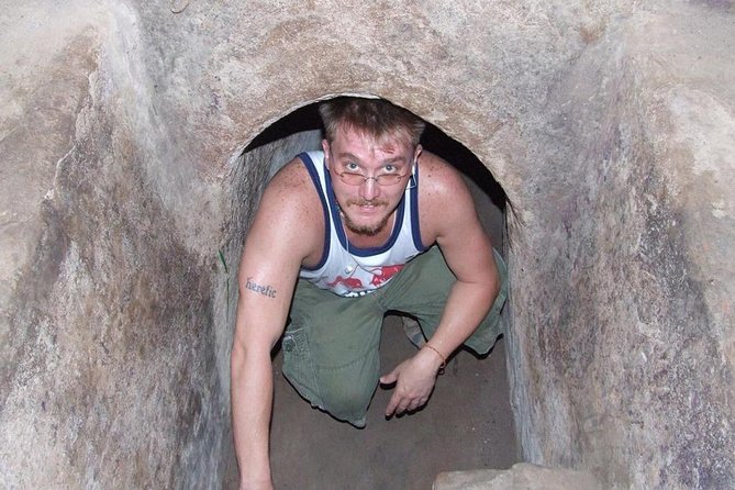 Cu Chi Tunnels and Mekong Delta 1 Day From Ho Chi Minh City - Entering the Cu Chi Tunnels