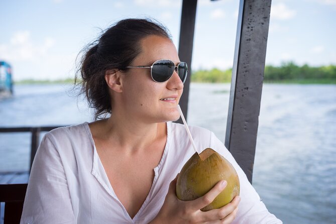 Cu Chi Tunnels and Mekong Delta 1 Day Tour from Ho Chi Minh City - Coconut sweets, rice paper, and local production