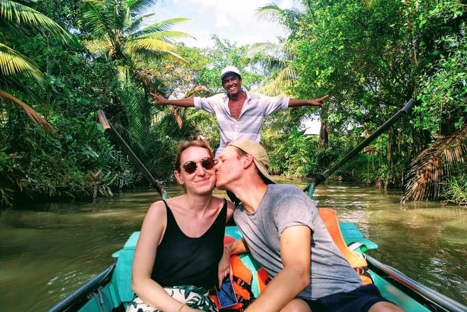 Cu Chi Tunnels and Mekong Delta 1 Day - A village walk, folk music, and a hand-rowed sampan