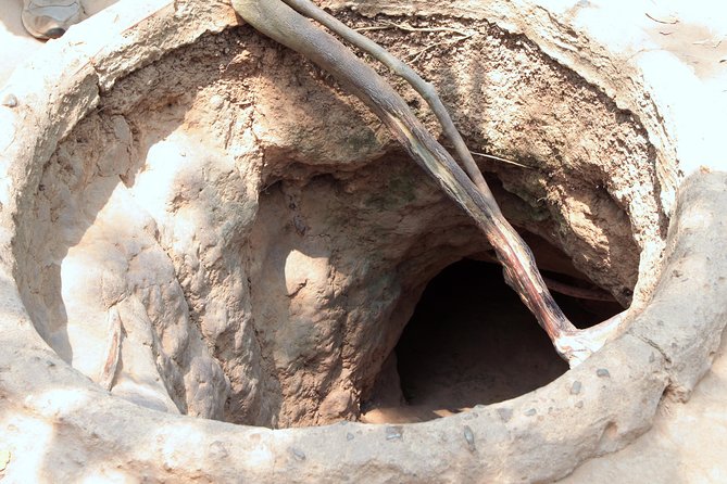 Cu Chi Tunnels and Mekong Delta Full Day Tour - Max 12 - Entering the Mekong Delta by boat