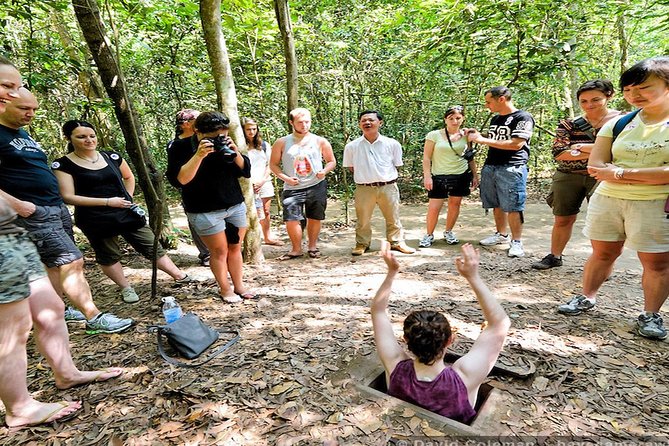 Cu Chi Tunnels - Mekong Delta Full Day Tours - Walking through the Cu Chi Tunnels