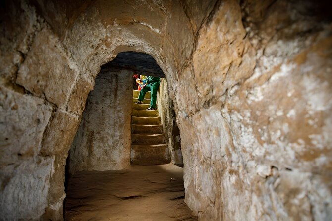 Cu Chi Tunnels Small Group Maximum 12 People From Ho Chi Minh - Hidden entrances and wartime camouflage