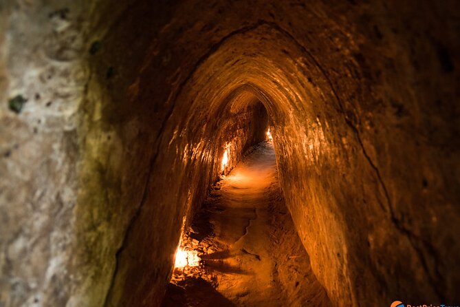Cu Chi Tunnels underground half day tours - The camouflaged trapdoor and the photo stop