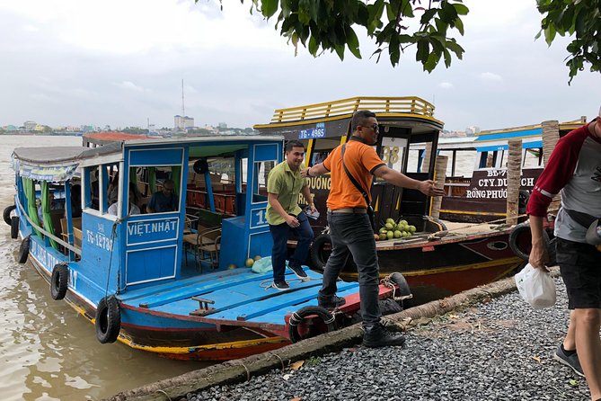 CuChi Tunnels&Mekong Delta-Boat,TukTuk,Coconut Village SmallGroup - Fruit, honey tea, coconut candy, and lunch