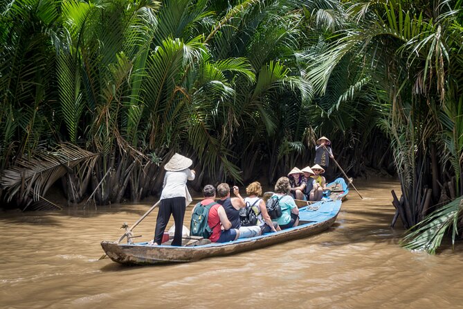 Essential Mekong Delta: Highlights Tour from Ho Chi Minh City - Fruit orchards, folk music, and local flavors
