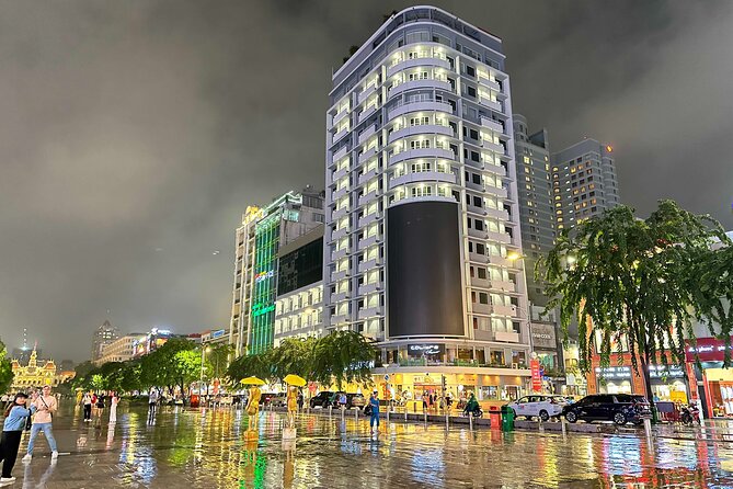 [Free E-sim] Evening Walking Tour in Saigon - Starting at % Arabica and Bitexco Financial Tower