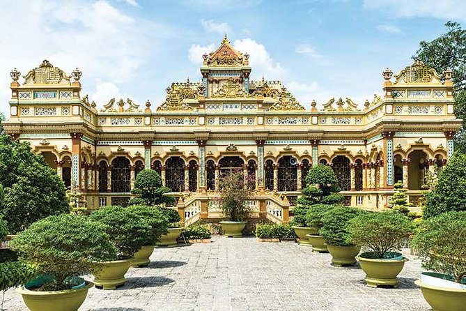 From HCM City: Mekong Delta Tour with Sampan Journey - Unicorn Islet, fruit, honey tea, and folk music