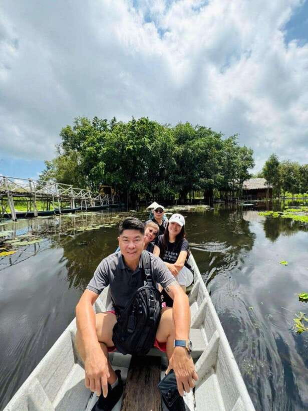 From Ho Chi Minh City: Tan Lap Floating Village Eco Day Tour - Wooden boats through Tan Lap’s narrow canals