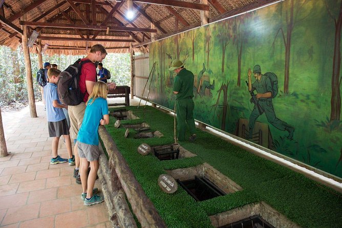 From Ho Chi Minh: Cu Chi Tunnels Half-Day History Tour with Guide - Command centers, bunkers, and the smoke-free stove