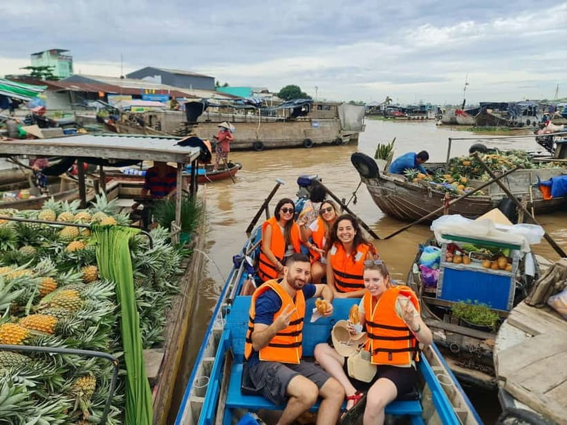 From Ho Chi Minh: Mekong & Cai Rang Floating Market 2D1N - My Tho begins with pagodas and river traffic