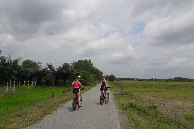 Full Day Experience Cu Chi Tunnels By Bikes. - Quiet lanes, farms, and rubber trees