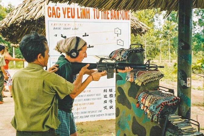 Half-Day Cu Chi Underground Tunnels Tour with Pick Up - Entering the Cu Chi tunnel complex