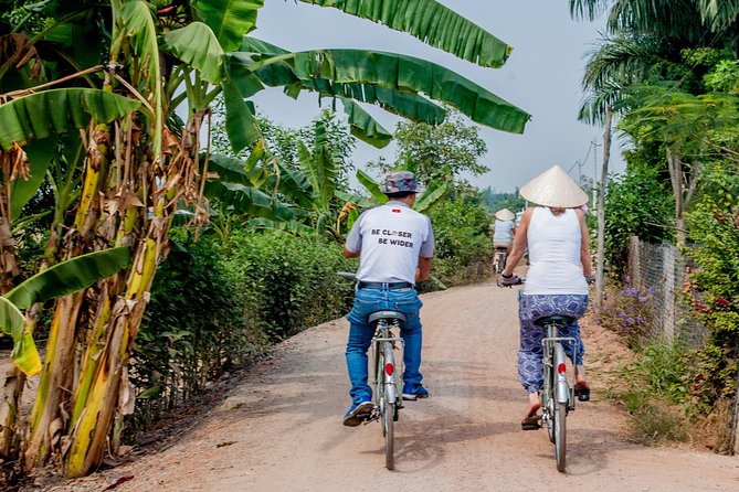 Half-Day Mekong Delta by Speedboat and Leisure Biking - Temples, pagoda architecture, and a rice-wine workshop