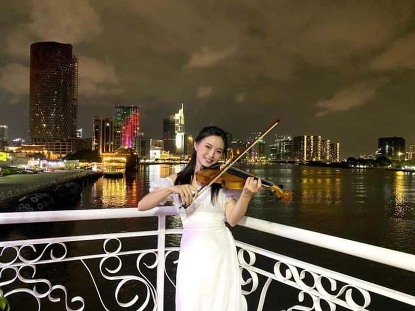HCM: Night Experience Dinner Cruise on Saigon River - Dinner with city lights beyond the rail