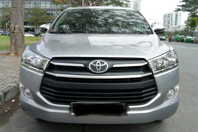 HO CHI MINH AIRPORT: CAR 7s PICK UP <-> HOTEL (one way transfer) - A private arrival at Tan Son Nhat Airport