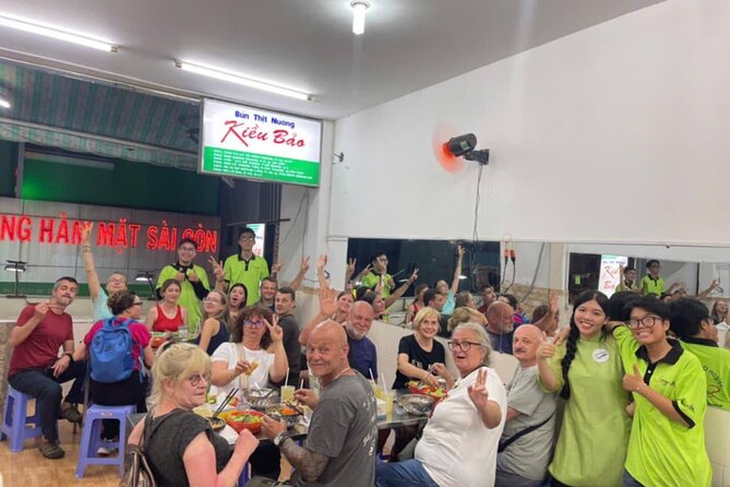 Ho Chi Minh City: Motorbike Street Food Tour with 12 Tastings - Stop three: bánh mì and spring rolls