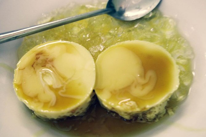 Ho Chi Minh City: Street Food Walking Tour with 12 Tastings - Sweet stops: grilled banana sticky rice cake and caramel flan