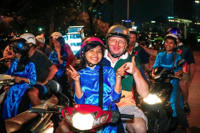 Ho Chi Minh Night Tour by Motorbikes with Female Rider | KissTour - Hồ Thị Kỷ Flower Market for 45 minutes
