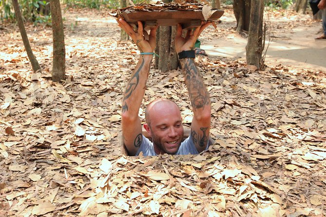 Luxury Speedboat 2 Ways from Ho Chi Minh city to Cu Chi Tunnels - Crawling through a tunnel, then trying cassava