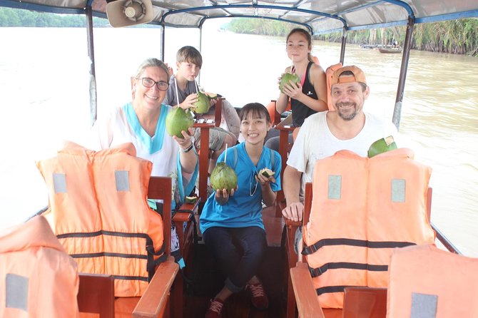 Mekong Delta Adventure from Ho Chi Minh City - The hand-rowed sampan through narrow canals