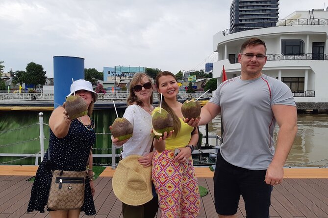 Mekong Delta Full Day Trip - My Tho & Ben Tre - Small Group Tour - Village music, fruit, and the visitor-focused stops