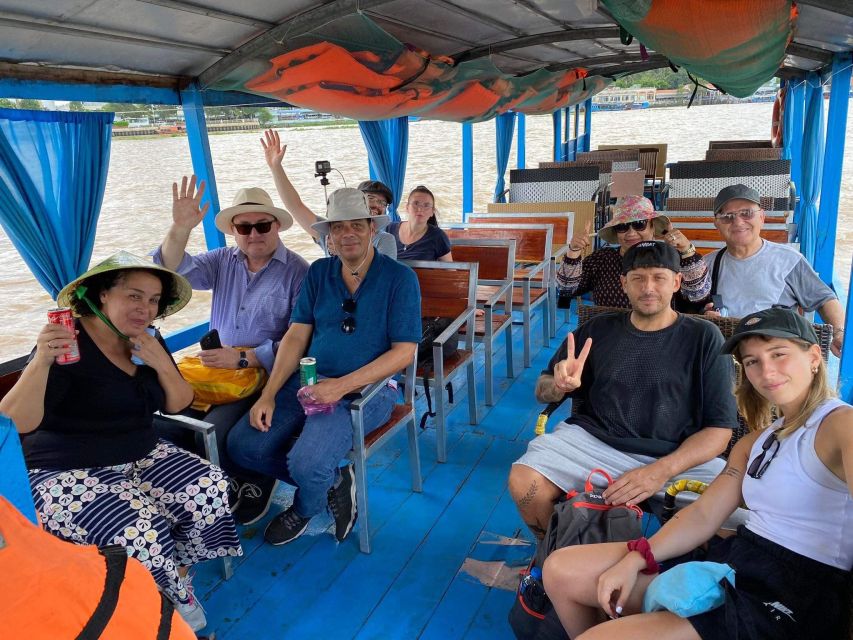 Mekong Delta Private Tour from Ho Chi Minh City - A sampan ride beneath the coconut trees