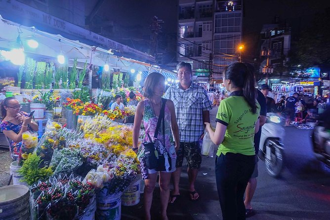 Morning Saigon Unseen+Street Food Tour with Ao Dai Riders Option - Ho Thi Ky Flower Market in a short, lively stop