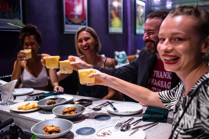 Night Food Tour in Saigon By Scooter - Twelve foods and drinks, not one oversized meal