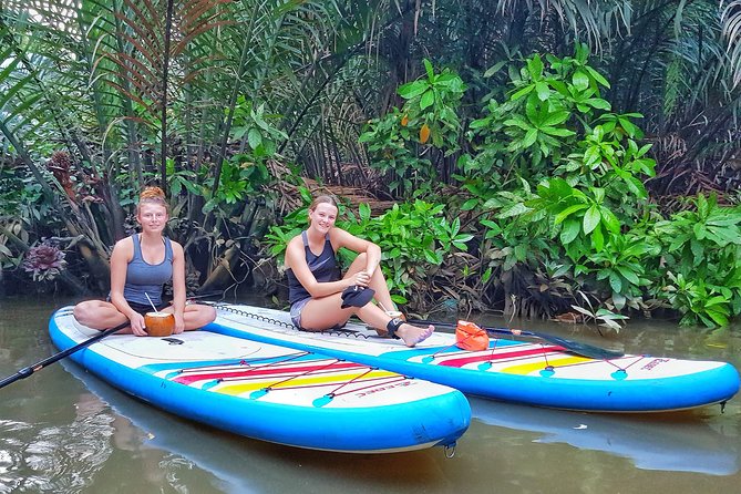 Paddling to explore the historic Vietnam War Rach Chiec jungle, - Paddling through the coconut jungle