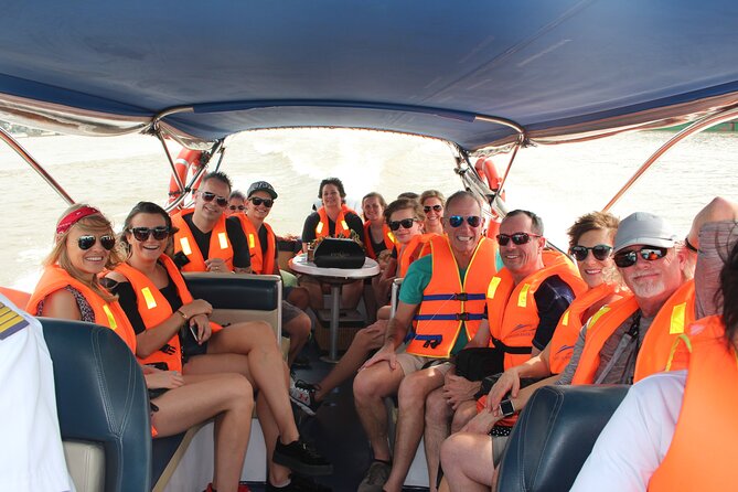 Premium Cu Chi Tunnels Tour with Local Expert by SpeedBoat - Crawling through a restored tunnel section