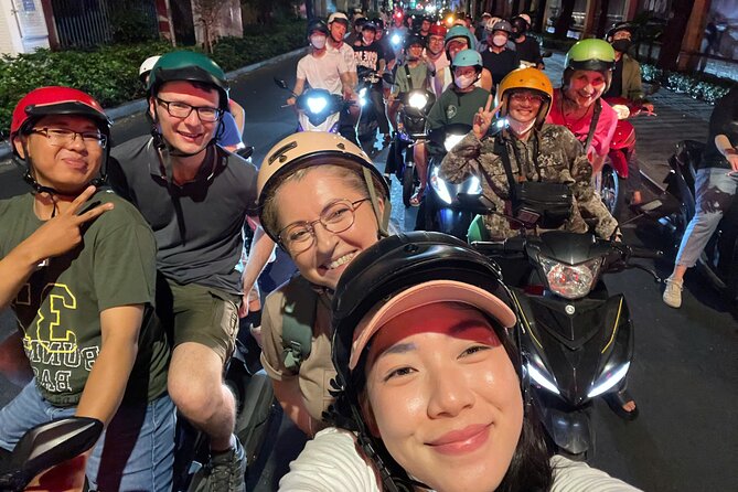 Private Discover Saigon Hidden Spots on Night Motorbike Adventure - Local baguette and beer in District 10
