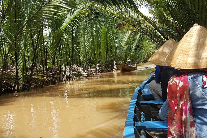 Private Mekong Delta Less Tourist - Coconut Island Tour - Vinh Trang Pagoda adds a cultural counterpoint