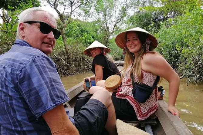 Private Mekong Delta Tour – Boat Ride & Local Lunch - Coconut palms and the narrow canals