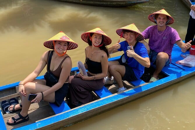 Private Mekong Delta tour to Cai Be – Tan Phong island full day - Coconut candy, crispy rice, and southern music
