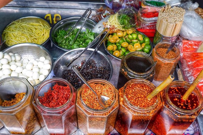 Private Saigon Street Food Tour with Motorbike - Snails and seafood at a local buffet