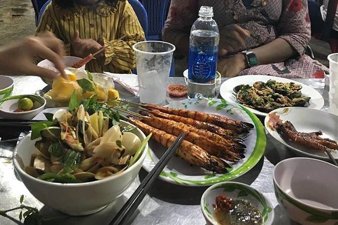Private Saigon Street Food Tour with Motorbike - Grilled beef wrapped in betel leaf with Vietnamese beer