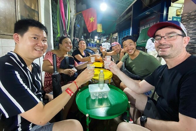 Private Saigon Ultimate Street Food & Motorbike Experience - Starting in District 1 on the back of a scooter