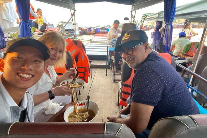 Private Scooter Street Food Tour in Saigon with 11 Tastings - Bánh xèo and bánh khọt at a neighborhood food stop