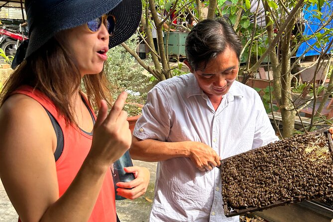Private Scooter Street Food Tour in Saigon with 11 Tastings - Old apartment blocks and bún bò Huế