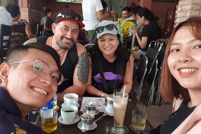 Private sight-seeing motorbike tour with local expert/student in HCMC - Food, coffee, and the small extras