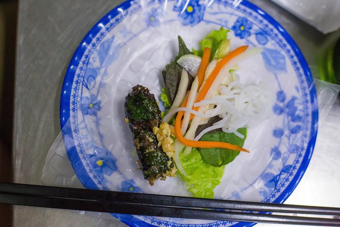 Private Street Food Evening Walking Tour in Ho Chi Minh City - The flower market adds a second kind of sightseeing