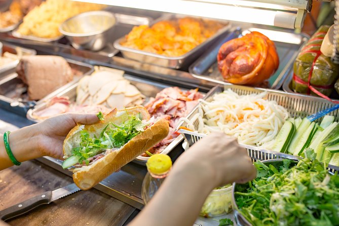 Private Street Food Evening Walking Tour in Ho Chi Minh City - What the guides add to the meal